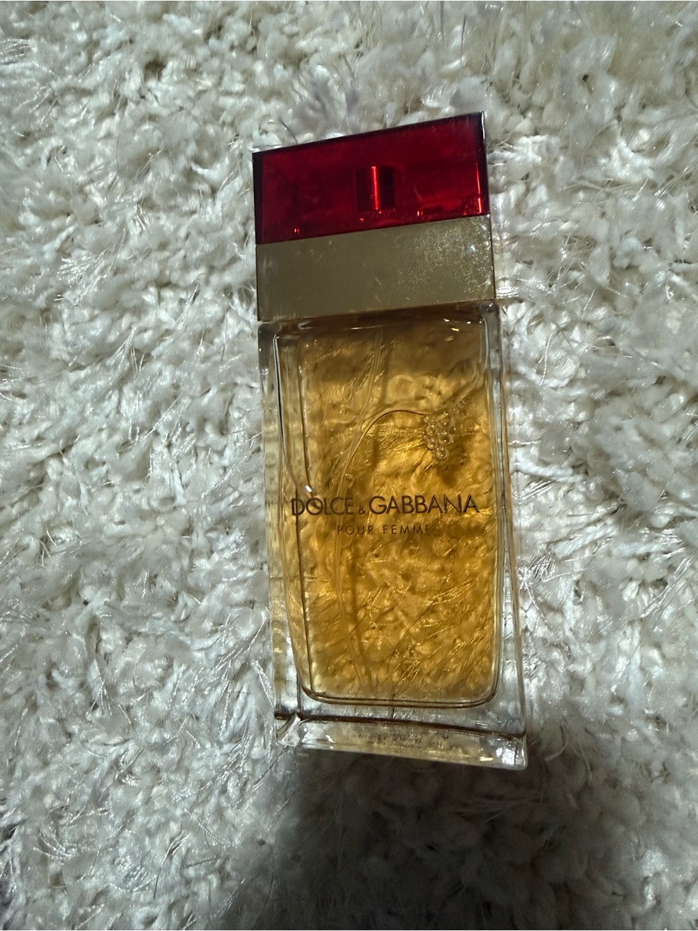 Fragrance Bottle on Carpet